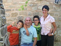 LODGING, BUREAUCRATIC GUIDANCE, ENTERTAINMENT - Teresa and Francesco Sausa, here with children Guiseppe and XXX